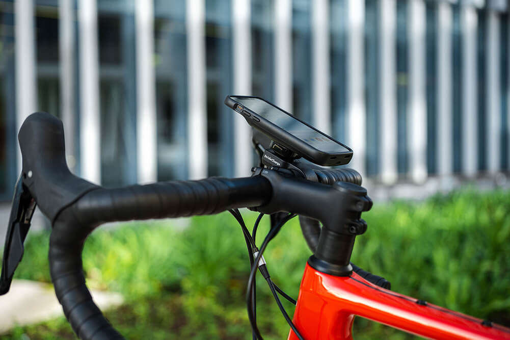 The StrideCharge attached to a bicycles handlebars